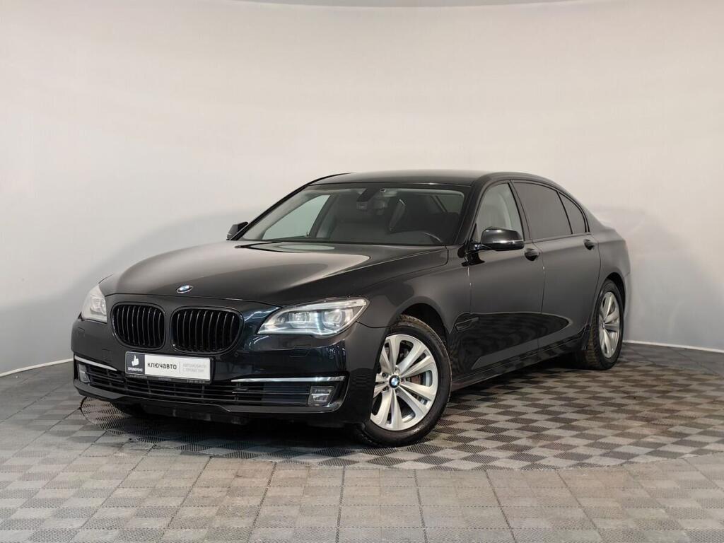 Черный BMW 7 серия 2013 года с пробегом