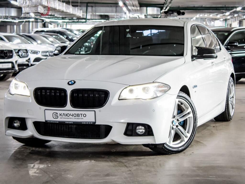 Белый BMW 5 серия 2014 года с пробегом