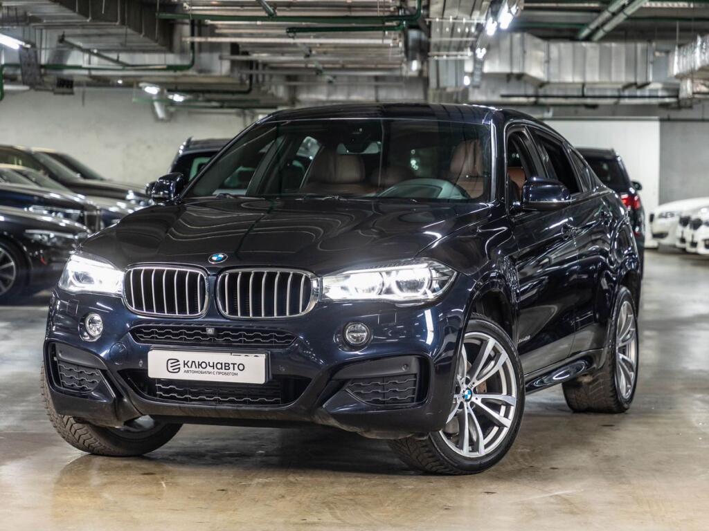 Черный BMW X6 2018 года с пробегом