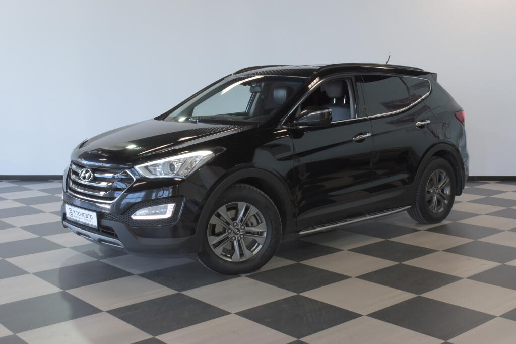 Черный Hyundai Santa Fe 2014 года с пробегом
