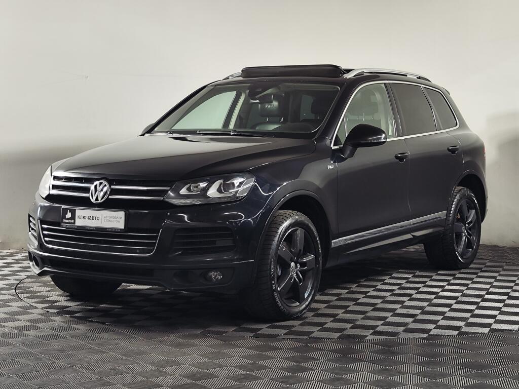 Черный Volkswagen Touareg 2014 года с пробегом