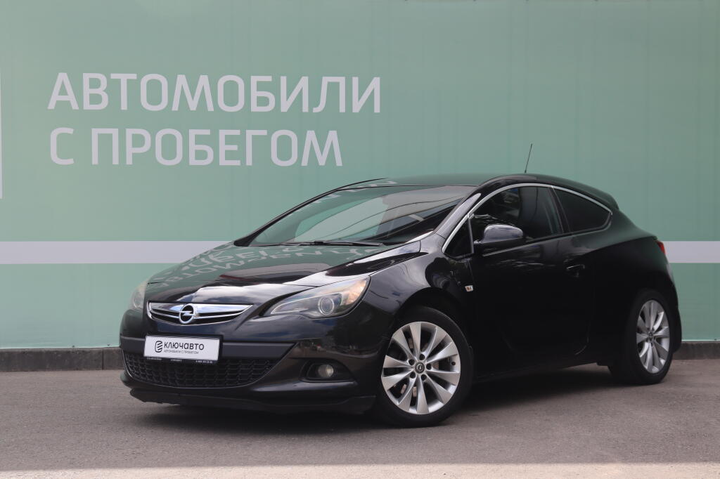 Черный Opel Astra 2013 года с пробегом